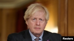 英国首相鲍里斯·约翰逊在首相官邸参加疫情视频会议。（2021年1月27日）