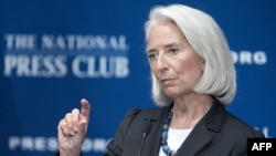 International Monetary Fund (IMF) Managing Director Christine Lagarde delivers remarks on the world's economy at the National Press Club in Washington, D.C, Jan. 15, 2014.