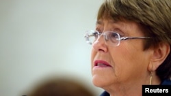 FILE - U.N. High Commissioner for Human Rights Michelle Bachelet attends a session of the Human Rights Council at the United Nations in Geneva, Switzerland, Feb. 27, 2020.