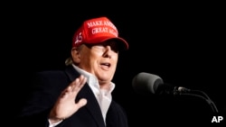 Former President Donald Trump speaks at a rally, Jan. 15, 2022, in Florence, Ariz.