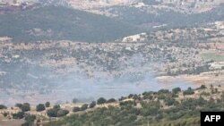 黎巴嫩真主党武装分子2023年11月23日对以色列与黎巴嫩边境附近的目标发动火箭袭击。（法新社照片）