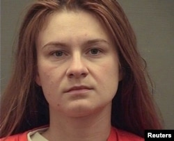 FILE - Maria Butina appears in a police booking photograph released by the Alexandria Sheriff's Office in Alexandria, Virginia, Aug. 18, 2018.