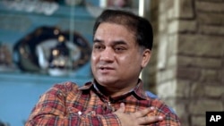 维吾尔族学者伊利哈木·土赫提。(2013年2月4日)