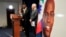 An image of Haitian President Jovenel Moïse, right, is displayed as Markenzy Lapointe, U.S. Attorney for the Southern District of Florida, speaks speaks during a news conference, Feb. 14, 2023, in Miami.