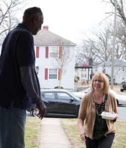 Meals on Wheels brings food to a senior in Virginia.