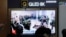 FILE - A TV screen shows an image of soldiers believed to be from North Korea standing in line to receive supplies from Russia during a news program at Seoul Railway Station in Seoul, South Korea, Oct. 21, 2024.