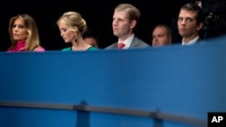 FILE - From left, Melania Trump, Ivanka Trump, Eric Trump, and Donald Trump, Jr., the family of Republican President-elect Donald Trump