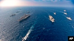 2020年11月，参加马拉巴尔海军演习，来自美、日、印、澳国家的航母和军舰。