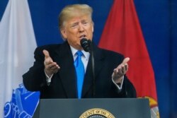 President Donald Trump speaks at the Veterans Day parade in New York, Nov. 11, 2019.