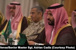 FILE - Saudi Arabia's Deputy Crown Prince and Minister of Defense Mohammed bin Salman, right, meets with Secretary of Defense Ash Carter, not shown, in Riyadh, Saudi Arabia, April 19, 2016.