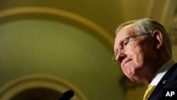 FILE - Senate Majority Leader Harry Reid during a news conference on Capitol Hill in Washington.