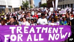 Civil rights activists march in Durban, South Africa, at the start of the 21st World Aids Conference, July 18, 2016. (AP Photo)