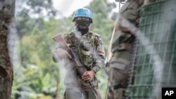 FILE - A United Nations MONUSCO peacekeeper deployed near Kibumba, north of Goma, Democratic Republic of Congo, on Jan. 28, 2022. 