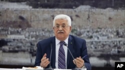 FILE - Palestinian President Mahmoud Abbas talks during a leadership meeting in Ramallah.