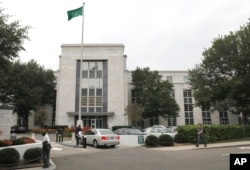 FILE - A car pulls onto the grounds of Saudi Arabia's embassy in Washington, Oct. 11, 2011. The interests of the kingdom are reportedly represented by at least two dozen lobbying firms in the U.S. capital.