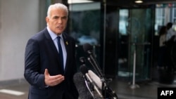 Israel's opposition leader and former prime minister Yair Lapid delivers a statement to the press following his meeting with U.S. Secretary of State Antony Blinken at the State Department in Washington, Sept. 16, 2024.
