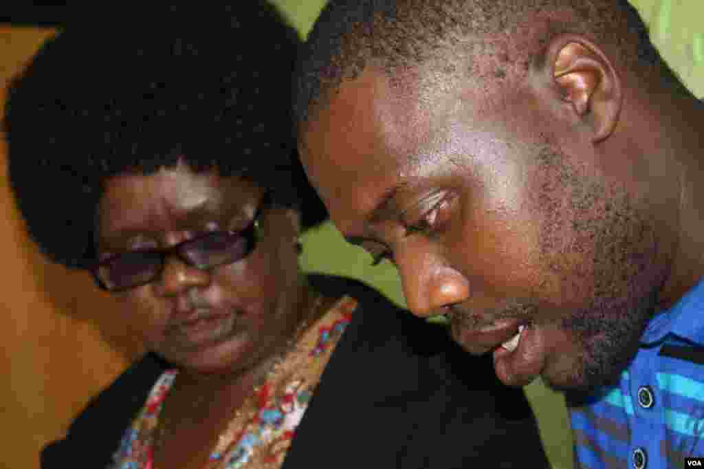 Charity Petelo [left], with her son, Sisa, a person living with schizophrenia at the Ikhaya Loxolo home in Hobeni, South Africa (VOA/ D. Taylor) 
