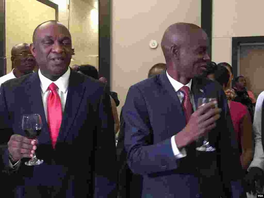 Haiti's President-elect Jovenel Moise participates in a toast with Senate leader Youri Latortue on the eve of the inauguration in Port-au-Prince, Haiti. (Photo: VOA Creole Service)