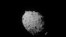 This image provided by NASA shows the asteroid Dimorphos, captured by NASA’s DART mission just two seconds before the spacecraft struck its surface, on Sept. 26, 2022. (NASA/Johns Hopkins APL via AP)
