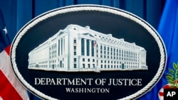 资料照片：美国司法部的标识。