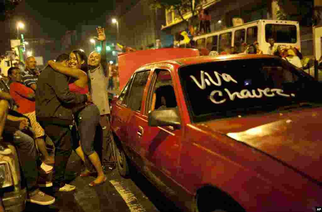 Supporters of Venezuela's President Hugo Chavez celebrate in downtown Caracas.