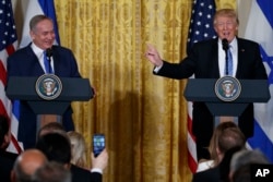 President Donald Trump speaks during a news conference with Israeli Prime Minister Benjamin Netanyahu in the East Room of the White House in Washington, Feb. 15, 2017.