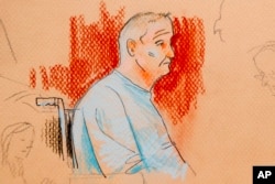 This courtroom sketch depicts Robert Gregory Bowers, who was wounded in a gun battle with police as he appeared in a wheelchair at federal court, Oct. 29, 2018, in Pittsburgh.
