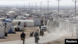 Suriyalik qochqinlar lageri, Mafraq shahri yaqini, Irodaniya, 7-dekabr, 2014-yil