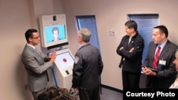 Aaron Elkins, an assistant professor at San Diego State University, has designed an Automated Virtual Agent for Truth Assessments in Real Time (AVATAR). The machine is designed to detect whether a person is lying. (Aaron Elkins/San Diego State University)