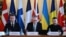 French President Emmanuel Macron, British Prime Minister Keir Starmer and Ukrainian President Volodymyr Zelenskyy prepare to hold a plenary meeting at a summit held at Lancaster House in central London on March 2, 2025.