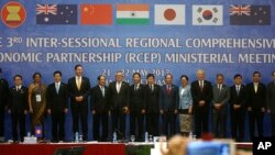 Trade ministers of 16 countries from the Asia-Pacific region stand for a group photo during the Regional Comprehensive Economic Partnership (RCEP) ministerial meeting in Hanoi, Vietnam on Monday, May 22, 2017. The ministers gather in Hanoi to