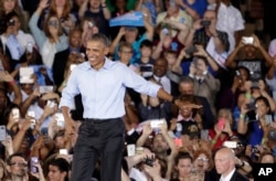 President Barack Obama arrives at a rally in North Las Vegas, Nev., Oct. 23, 2016.