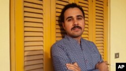 FILE - Egyptian author Ahmed Naji poses for a photo in Cairo, Egypt, in this undated image. Naji was sentenced to two years in jail Feb. 20, 2016, by a Cairo appeals court for publishing a sexually explicit excerpt of his novel that prosecutors said violated “public modesty.”