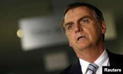 FILE PHOTO: Brazil's President-elect Jair Bolsonaro arrives for a meeting in Brasilia, Brazil, Nov. 20, 2018.