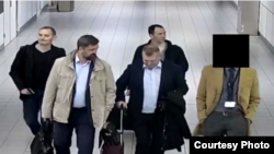 Alleged Russians operatives who later were found attempting to hack into computer networks in the Netherlands arrive at Amsterdam's Schipol Airport. (Source - Netherlands Defense Ministry via U.S. Department of Justice)