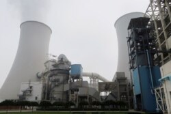 Sebuah Pembangkit Listrik dengan bahan bakar batubara di Sanhe, China (foto: ilustrasi). China dan AS adalah negara penghasil emisi gas rumah kaca terbesar di dunia.
