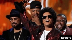 Bruno Mars accepts the Grammy for album of the year for "24K Magic." (REUTERS/Lucas Jackson)