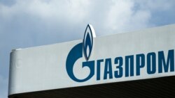 FILE - The logo of Russia's energy giant Gazprom is pictured at one of its gasoline stations in Moscow, April 16, 2021.