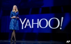 FILE - Yahoo president and CEO Marissa Mayer speaks during the International Consumer Electronics Show in Las Vegas.