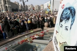 People take part in a rally in central Kyiv, Ukraine, demanding liberation of Ukrainian army pilot Nadezhda Savchenko by Russia, March 6, 2016.