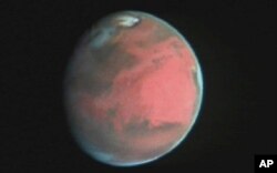 Barcha sayyoralardan insoniyatni aynan Mars qiziqtirib keladi. Xabble teleskopi yordamida olingan surat.