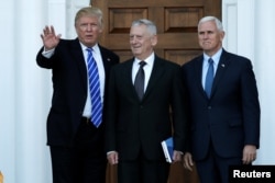 U.S. President-elect Donald Trump and Vice President-elect Mike Pence greet retired Marine General James Mattis for a meeting at the main clubhouse at Trump National Golf Club in Bedminster, New Jersey, November 19, 2016.