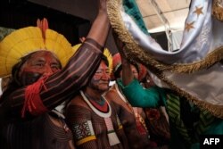 Indigenous leaders participate in the press conference given by the Imperatriz Leopoldinense samba school, whose theme this year pays homage to the native people of Brazil's Amazon region, ahead of the carnival parade at Cidade do Samba in Rio de Janeiro, Brazil, Feb. 24, 2017.