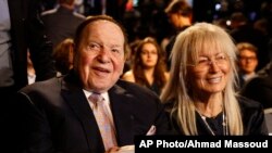 Sheldon Adelson sits with his wife Miriam waits for the presidential debate between Democratic presidential nominee Hillary Clinton and then-Republican presidential nominee Donald Trump at Hofstra University in Hempstead, N.Y., Monday, Sept. 26, 2016.
