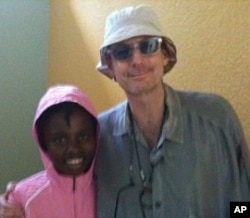 David Saltz with Haitian earthquake survivor Nathana Gerome, 13, 7 Apr 2010
