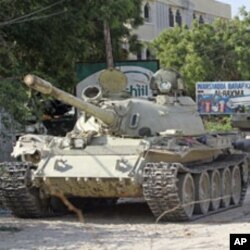 African Union Mission in Somalia tanks patrol after fighting against Islamist insurgents al-Shabab, in Suqa Holaha village of Horiwaa district, Mogadishu, Somalia, March 3, 2012.