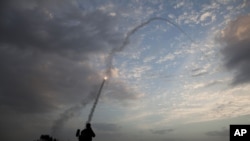 An Iron Dome missile is launched in Tel Aviv to intercept a rocket launched from Gaza, November 17, 2012.