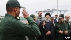 Iranian President Ebrahim Raisi (C-R) visiting the Iranian revolutionary guards corps (IRGC) navy base in Bandar Abbas on February 2, 2024.
A handout picture made available by the Iranian presidential office on February 2, 2024. (Iranian presidential office/via AFP)