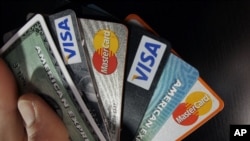FILE - U.S. law enforcement officials have charged a Russian national with running Try2Check, a network of websites that verified stolen credit card numbers for cybercriminals.
