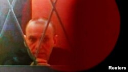 Ruski opozicinar Aleksej Navalni na ekranu tokom saslušanja putem video lika iz zatvroske kolonije u Karpu, u regionu Jamal-Nenets, 11. januara 2024. godine. (Rojters/ec/Maxim Shemetov/arhiva).